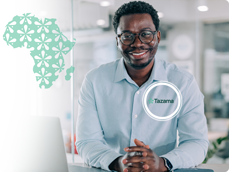 Man smiling with Tazama shirt on